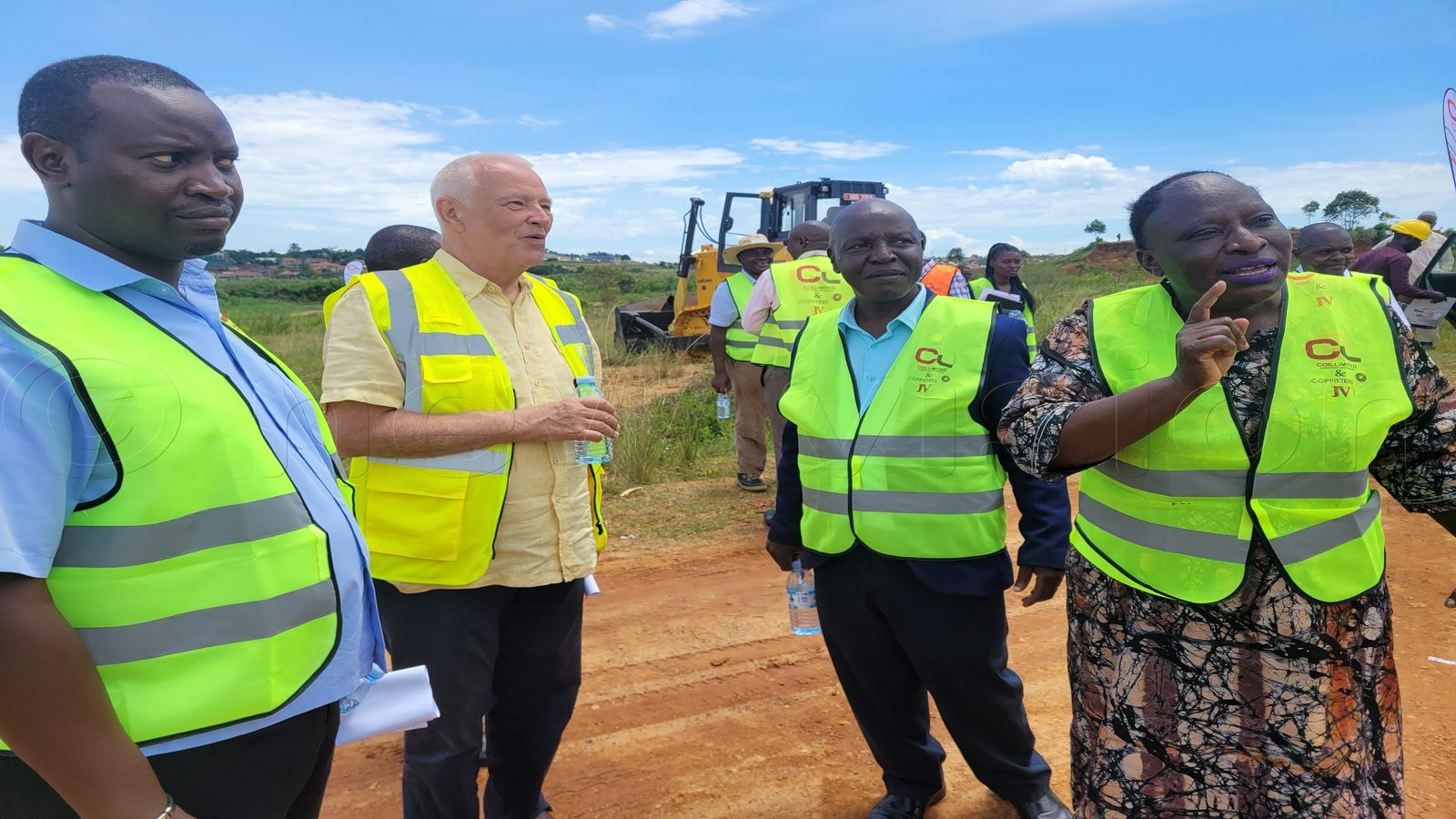 On the right   Rose Mary Tibiwa  the commissioner for  transport services and infrastructure services with the ministry of works and transport during the launch of the first phase of construction of Bukasa port that involves swamp refilling and reclaiming   for the port . On the right is  Apollo  Kashanku the project manager